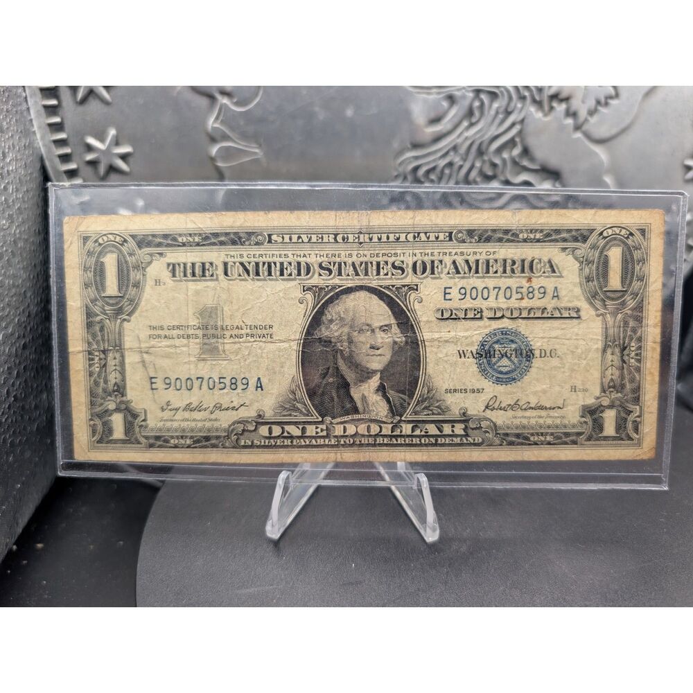 1957 $1 Silver Certificate • Blue Seal • E90070589A • Clean Circulated